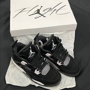Jordan 4 Retro Black and White Sneakers